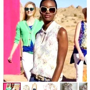 Cabi Essential Blouse. Style #5535. Sleeveless peplum top. Size M.